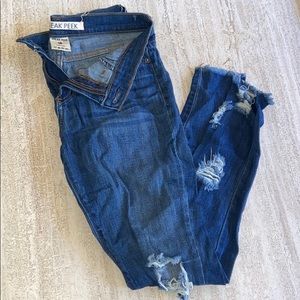 Sneak Peek Low Rise Ripped Medium Wash Jeans